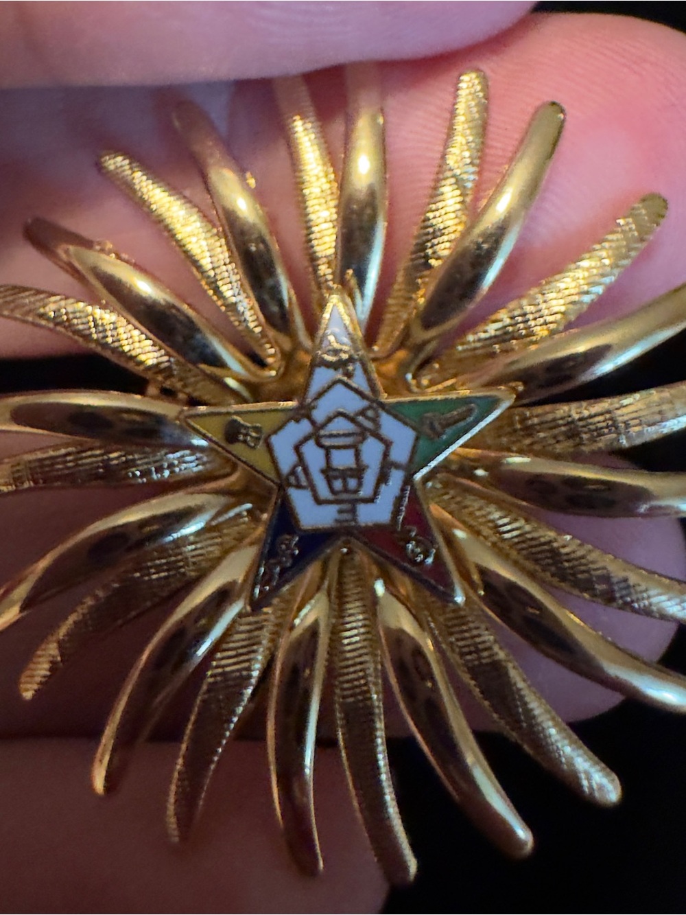 Gold Starburst Enamel Brooch with Multicolor Star Accent